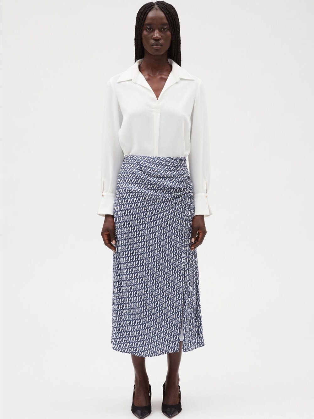 Claudine Pierlot Monogrammed blue midi skirt